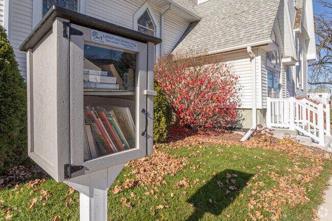 "Take a book, share a book" at Potterville neighborhood Little Free Libraries.