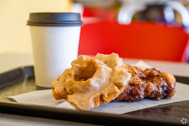 Enjoy a fresh baked breakfast treat and hot coffee at 5280 Donuts in Lac Amora.