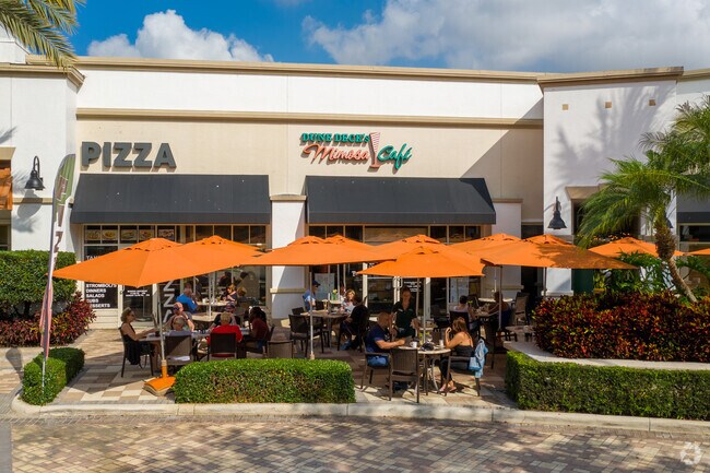 Savor brunch delights at Dune Deck's Mimosa Café near Valencia Isles.