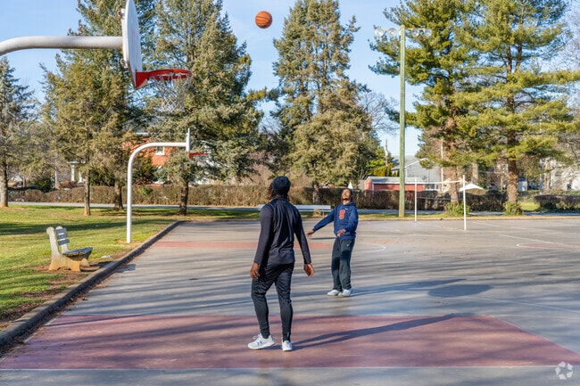 Basketball buddies from Bloomingdale shoot some hoops at the courts in Stauffer Park.