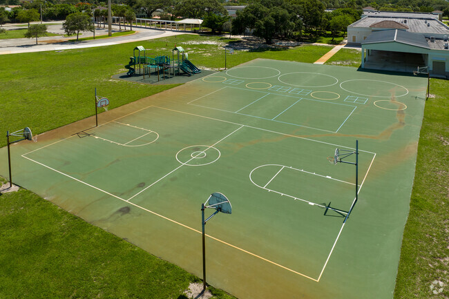 J. C. Mitchell Elementary School features a basketball court and playground students can enjoy.