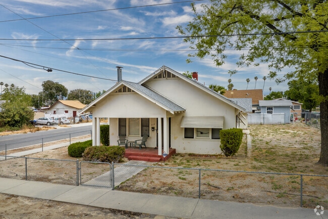 Small Single-Family Home with Porch Seen in a Neighborhood in Downtown Hemet