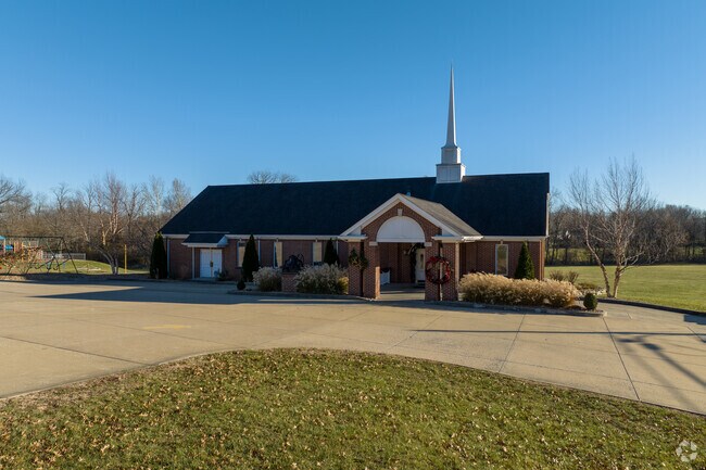 The main chapel of Troy Holiness School is located in front of the property.
