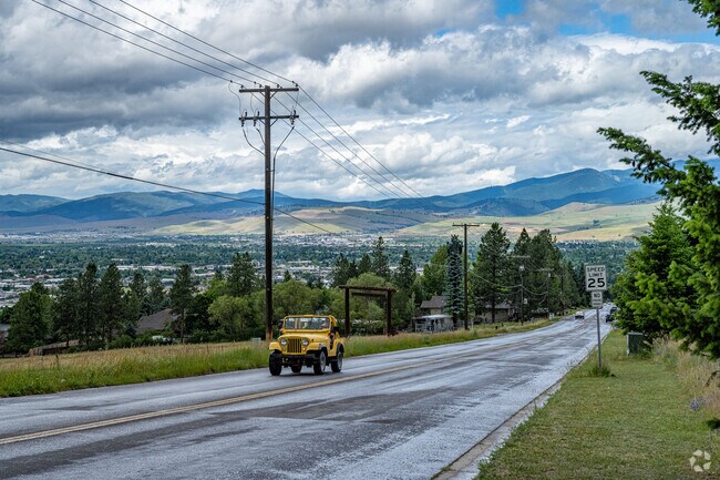 Pattee Canyon captivates with its towering pines and winding trails through the wilderness.