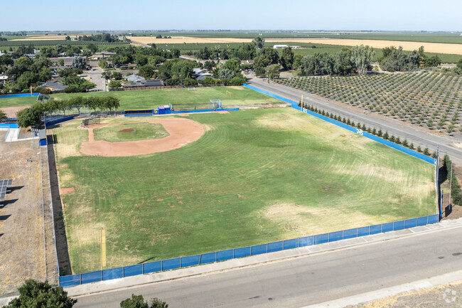 There is a baseball field at Dos Palos High School in Dos Palos.