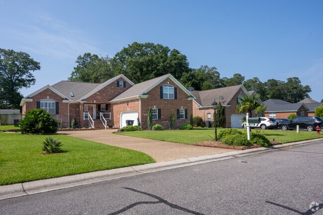The Cape offers a diverse selection of homes, including charming brick patio residences that blend style with easy maintenance.