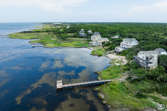 Find coastal home styles with striking architectural style on the Pamlico Sound in Buxton.