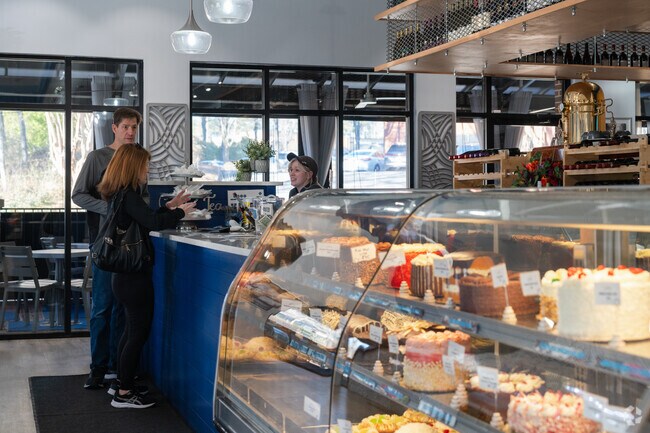 Explore stunning displays of artisan cakes, pastries, and baked goods at Edenwilde’s Alpine.