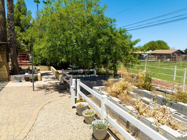 Lehi Montessori features a school garden for students to use.