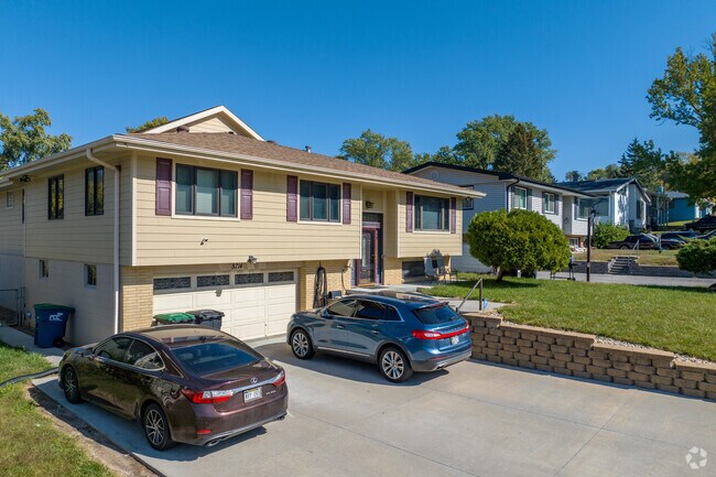 Split level and raised ranch homes set into Hartman Avenue's hills are commonplace.