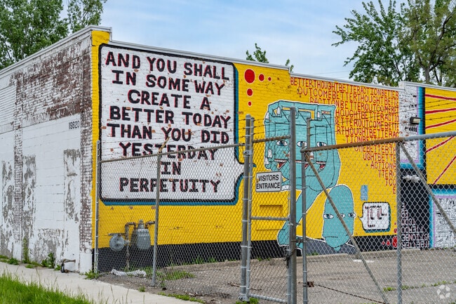 Colorful murals adorn buildings throughout Penrose.