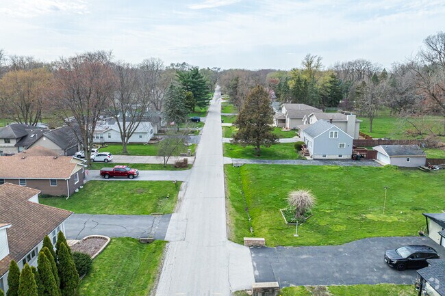 Residents enjoy their spacious lawns in East Hazel Crest.