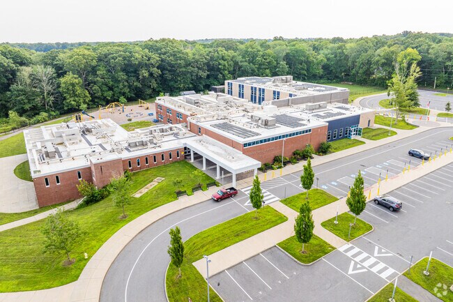 Stop into Gallup Hill School for a quick introductory meeting with it's staff.