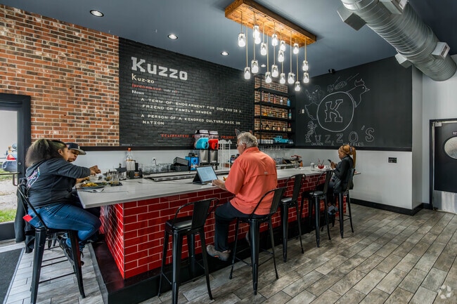 Stop in for a drink at Kuzzos Chicken and Waffles when visiting the Oak Grove neighborhood.