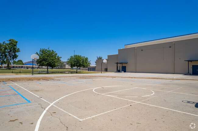 Play basketball on the court at Royal Palm Middle School in Phoenix.