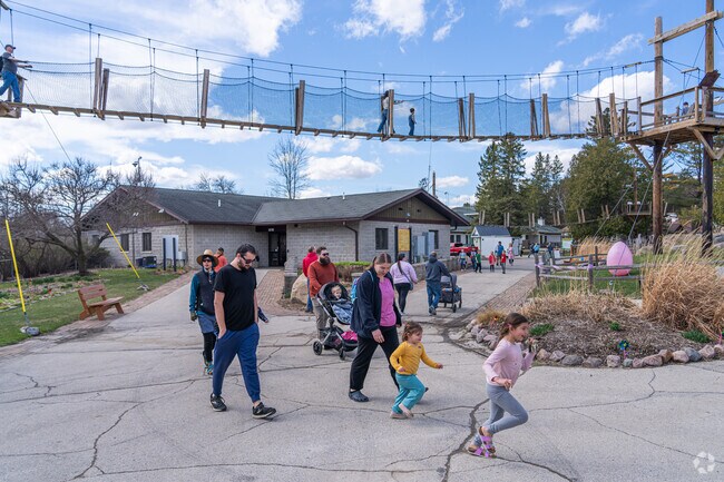 The NEW Zoo & Adventure Park features a canopy walk, zip line rides, and animal exhibits.