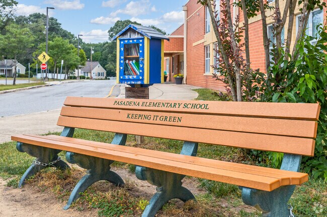 Pasadena Elementary promotes neighborhood book exchanges with Little Free Library.