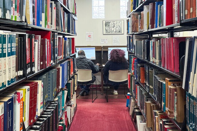 Residents enjoy the many options for reading at the William Leonard Public Library in Robbins.