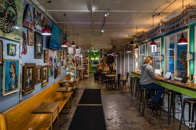 Sip, snack, and snuggle with adoptable cats at Nine Lives Cat Cafe in Fountain Square.