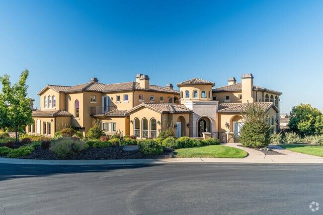 Large upscale Mediterranean style home sits overlooking Verdera Village Neighborhood.