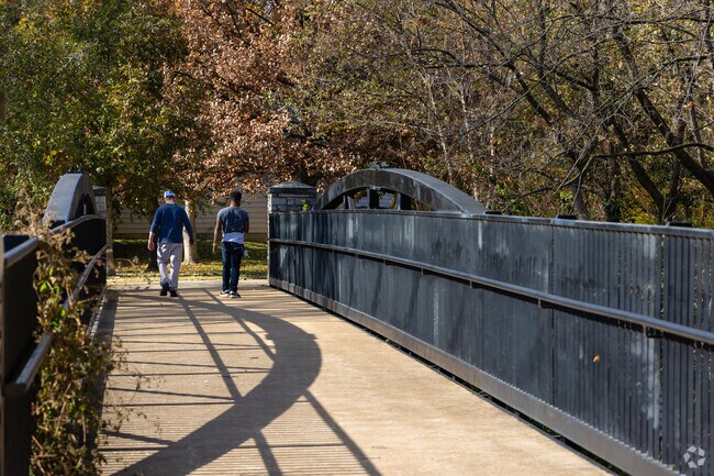 People enjoy walking along the  Deer Creek Greenway in Brentwood.