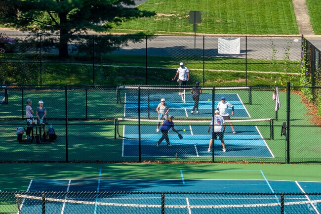 Visitors can watch or play tennis at Upper Onondaga Park in Brighton.
