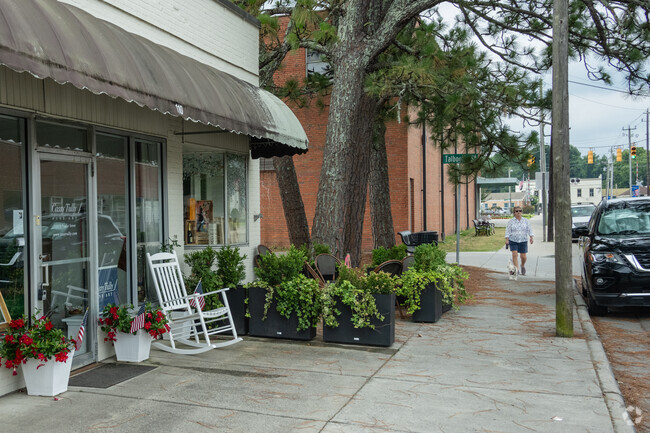 Locals enjoy taking their pets for a walk in the Seagrove, area near Grassy Creek.