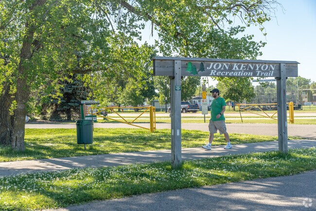 Enjoy the scenic John Kenyon Recreation Trail within Elmwood Court for outdoor activities.