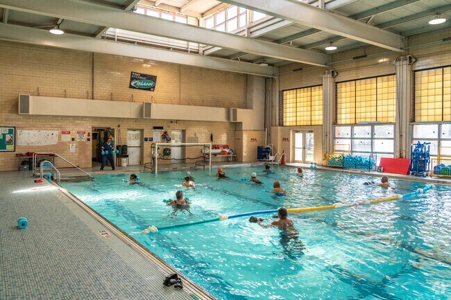 Participants in water aerobics classes at West Pullman Park near Calumet Park have a lot of fun.