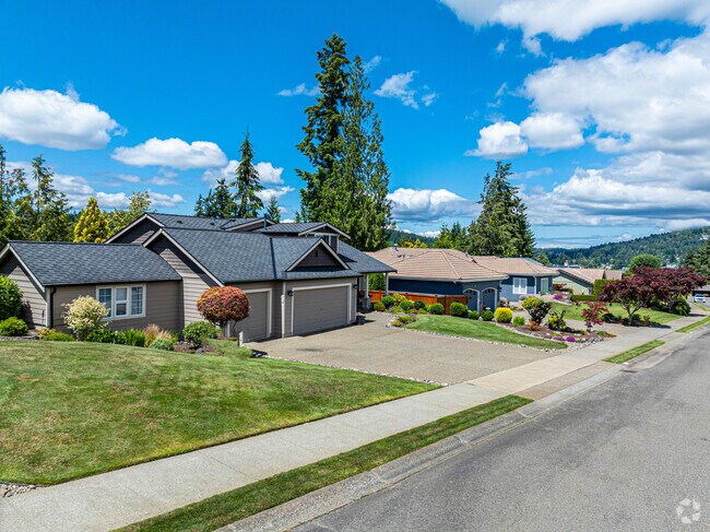 Beautiful ranchers line this Lofall neighborhood street.