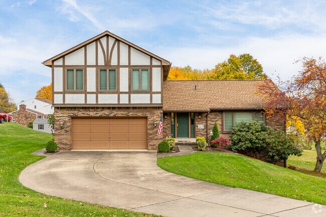 A beautiful Tudor-style home sits on a peaceful street in Buffalo Township.