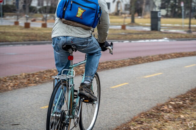 Bikers commute through Howe on bike exclusive trails.