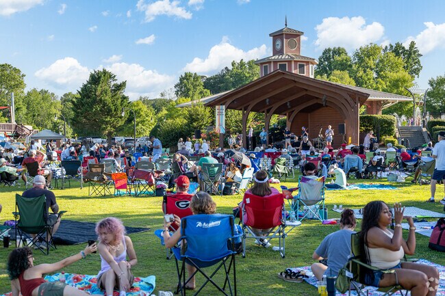 Locals gather from all over Lilburn for the monthly Food Truck event in City Park.