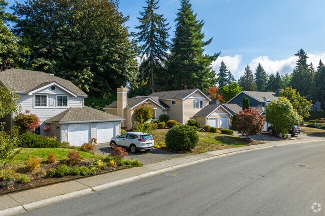 A peaceful row of homes in English Hill, framed by autumn trees.