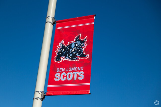 A red banner hangs on a pole at Ben Lomond High School.