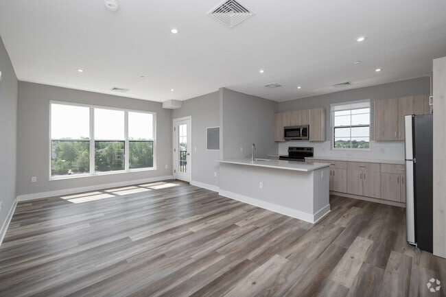 2BR, 2BA - 1,076 SF - Living Room and Kitchen
