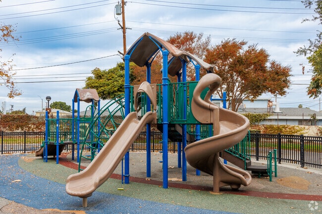 Kids enjoy the playground at Grace Park.