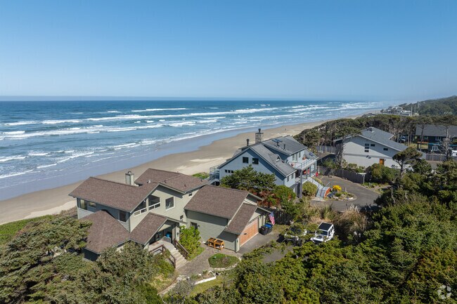 Homes in San Marine boast forested landscapes and coastal beach views.