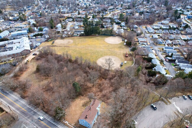 Captain Stephen Olney Memorial Park is a popular gathering space where folks can play baseball in the center of Geneva.