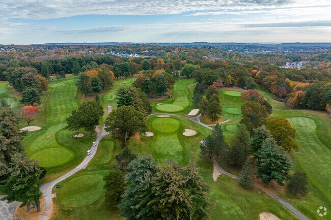18 holes at Pequabuck Golf Club never looked so good.