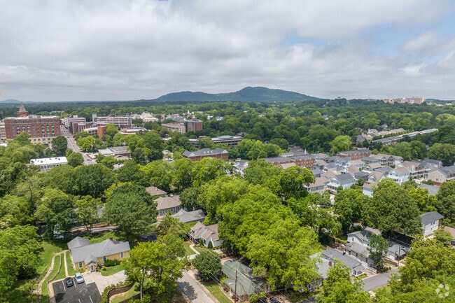 Fort Hill-Roosevelt features a blend of suburban density and scenic terrain with rolling hills.