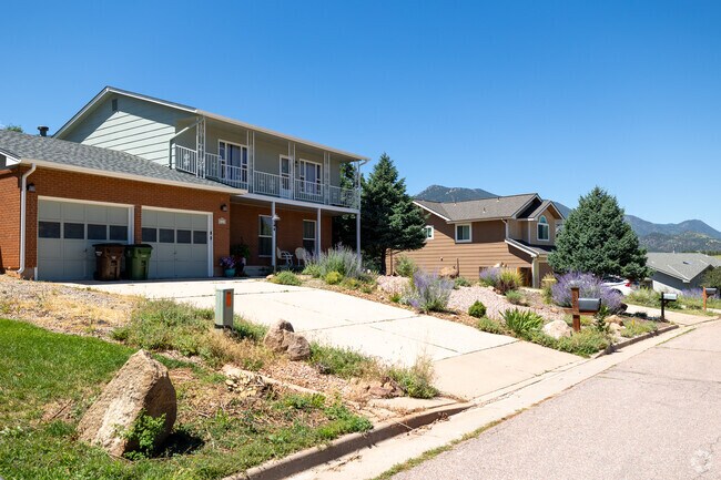 Two-story homes with spacious garages are common in Manitou Springs.