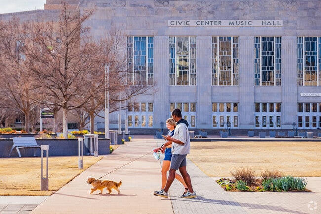 Classen North Highland Park residents enjoy downtown strolls with their furry companions.