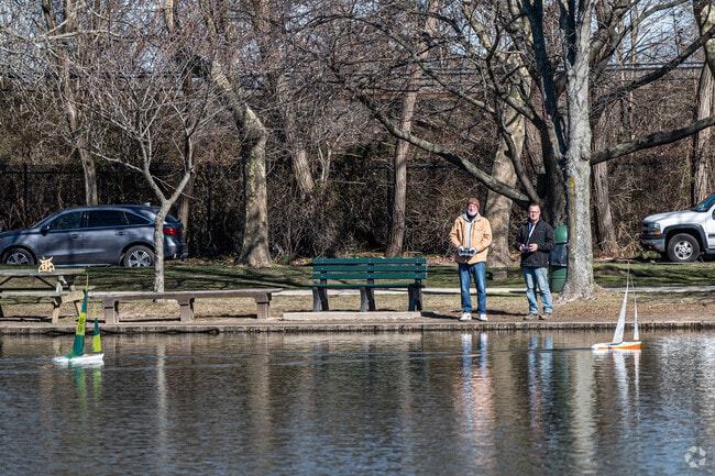 Sailboat enthusiasts often launch model boats on the pond at Babylon Town Hall in Lindenhurst.