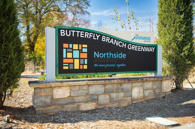 A sign for Butterfly Branch Greenway and the Northside neighborhood.