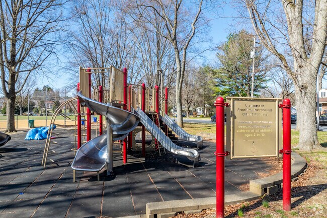 Local families enjoy the playground at Brookline Park.