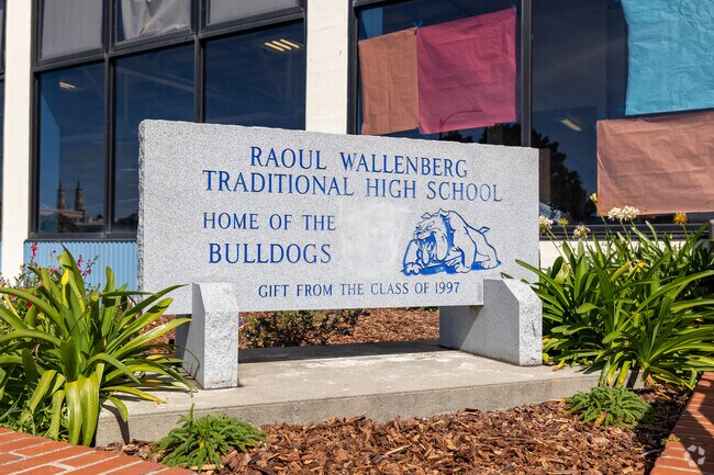 A gift from the Class Of 1997, a granite sign welcomes you into Raould Wallenberg High School.