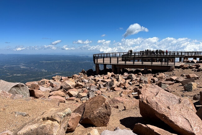 Pikes Peak Cog Railway rewards riders with breathtaking summit views.