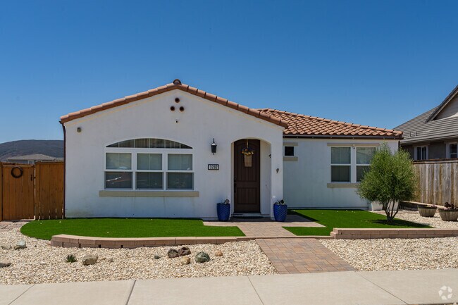 A Spanish style inspired home in Margarita has a drought tolerant front yard.