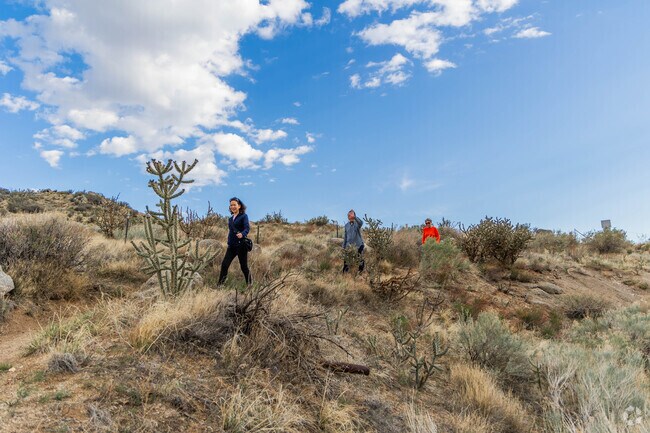 The Sandia Mountains offer amazing walking trails for residents of S Y Jackson.
